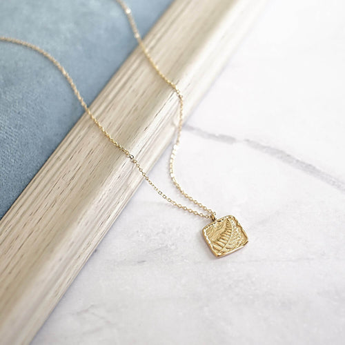 Kora Garro Jewelry gold necklace fossil fern