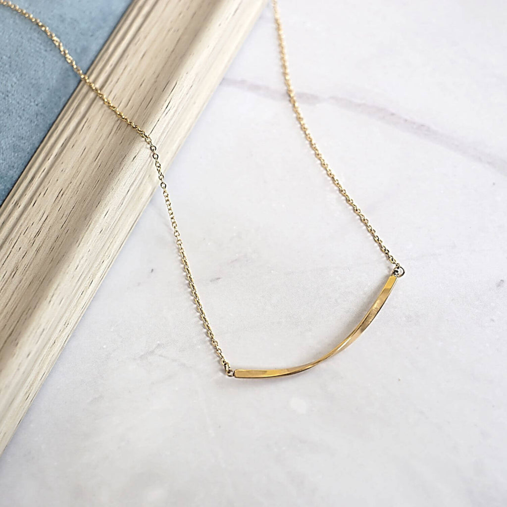 Kora Garro Jewelry minimalist necklace mobius smile bar necklace gold necklace