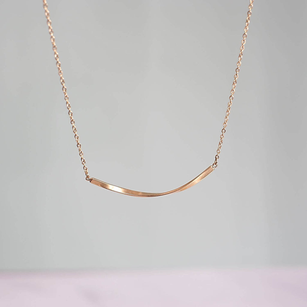 Kora Garro Jewelry minimalist necklace mobius smile bar necklace gold necklace