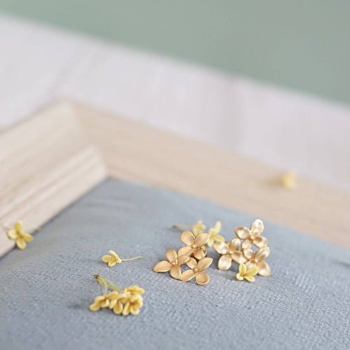 Kora Garro jewelry flower earrings gold earrings stud earrings nature inspired earrings triangle flowers Avery