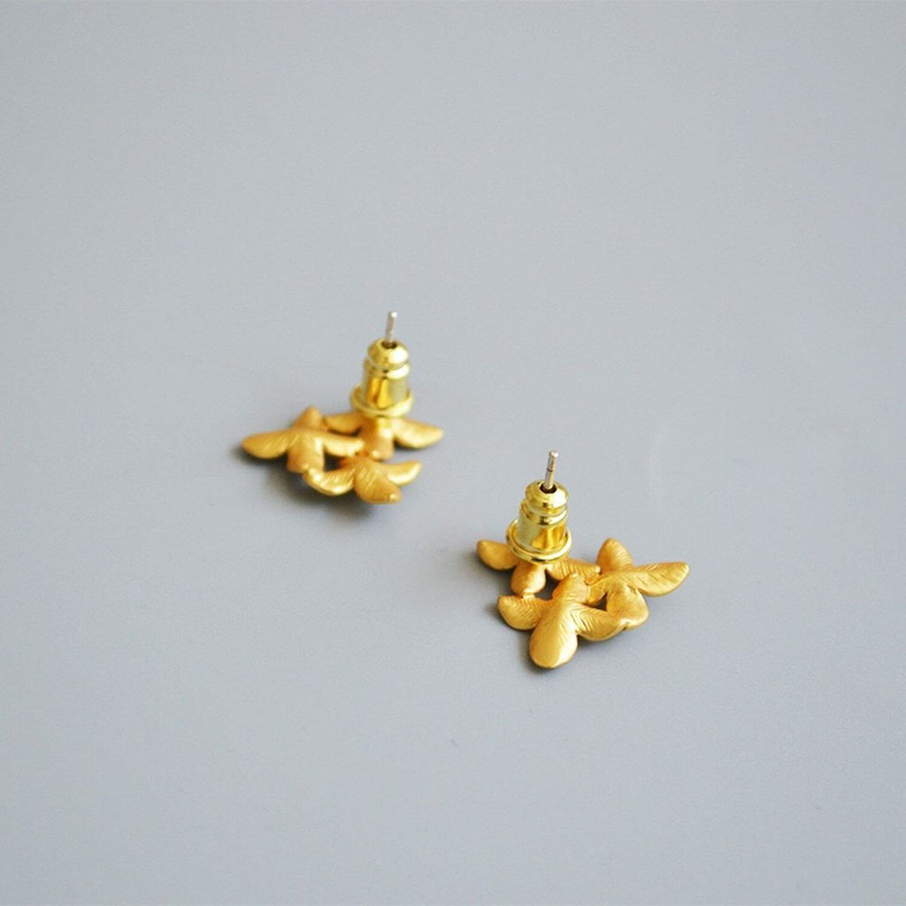 Kora Garro jewelry flower earrings gold earrings stud earrings nature inspired earrings triangle flowers Avery