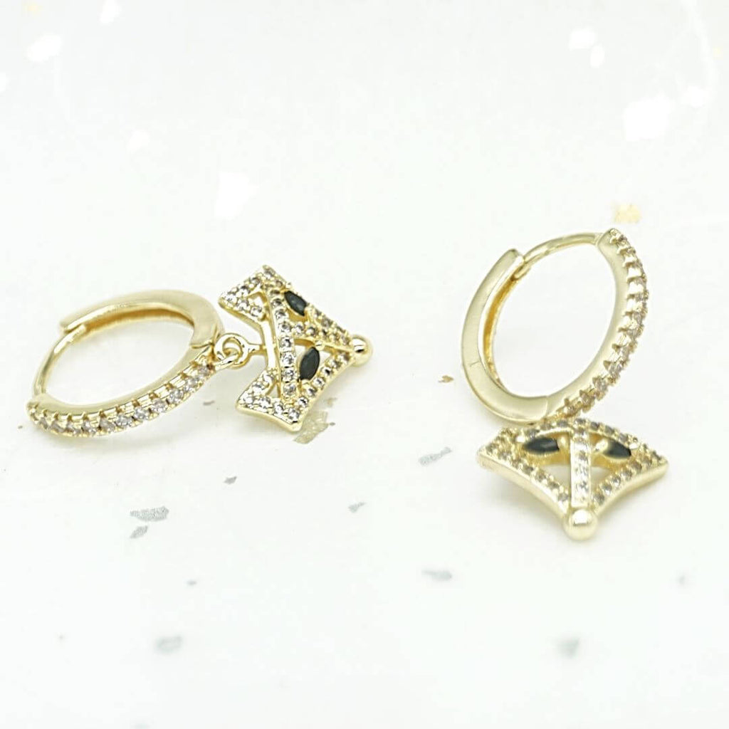 kora garro jewelry huggie hoop earrings gold fox Eliza