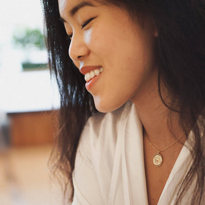 gold vermeil necklace celestial dainty necklace sun moon and star reversible pendant necklace koragarro jewelry