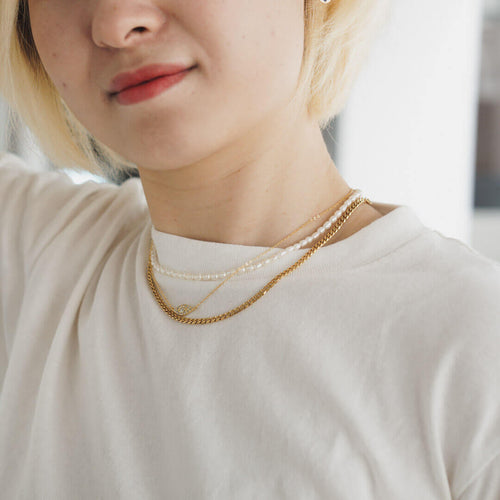 koragarro layered necklace pearl choker evil eye necklace Cairo