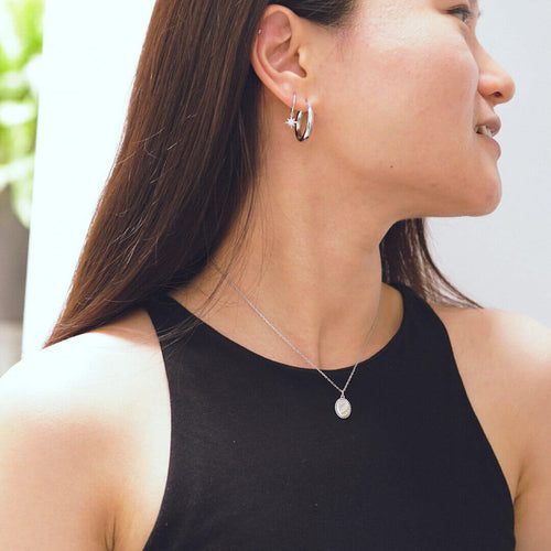 sterling silver earrings star huggie earrings nova koragarro